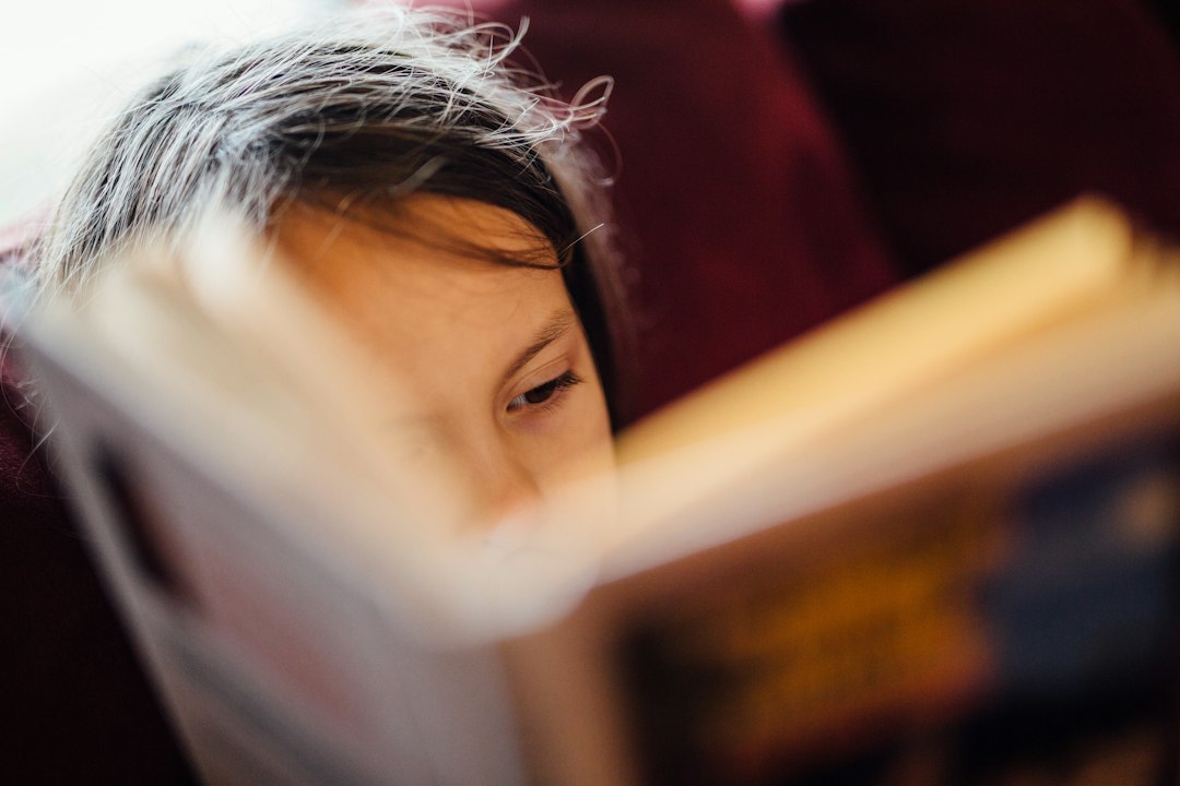 My daughter, reading a book.